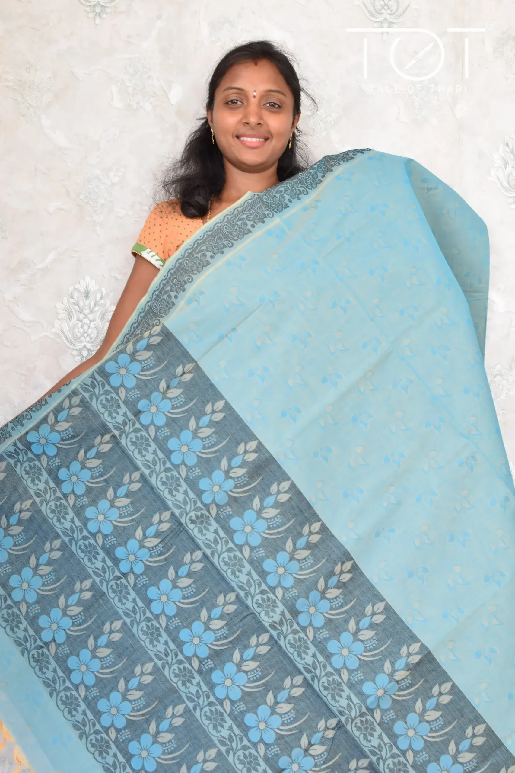 Pure Cotton Plain Embossed Blue Saree With Color Thread Woven Border And Running Blouse