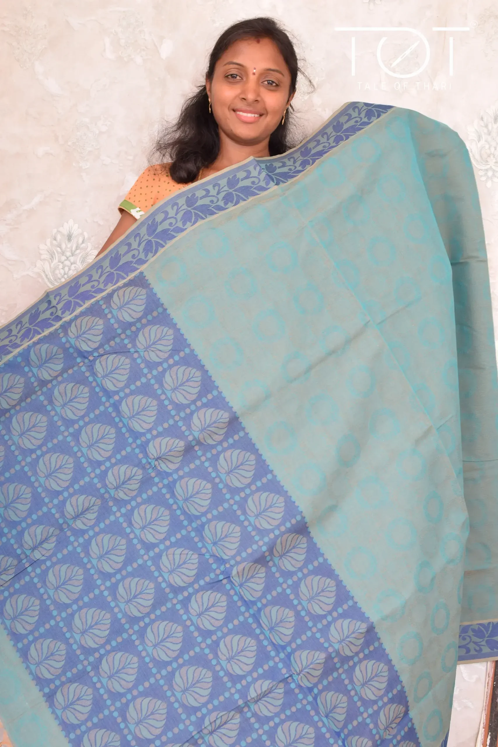 Pure Cotton Plain Embossed Blue Saree With Color Thread Woven Border And Running Blouse